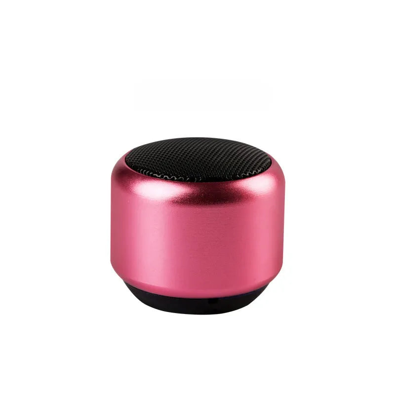 Small portable Bluetooth wireless speaker in black, blue, gold, or pink colour options.