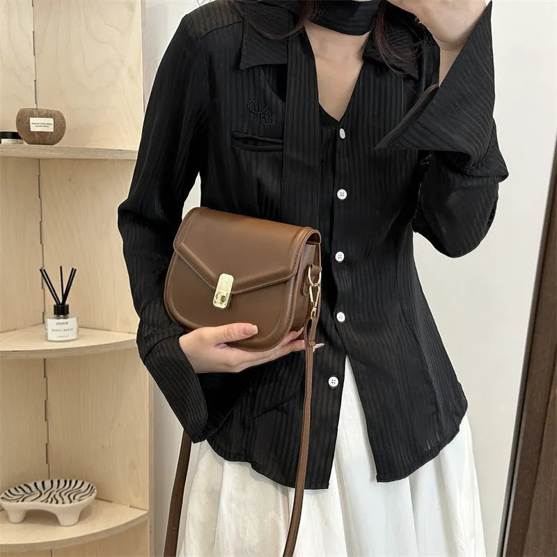 Soft PU leather horizontal square messenger bag with clamshell opening in khaki colour