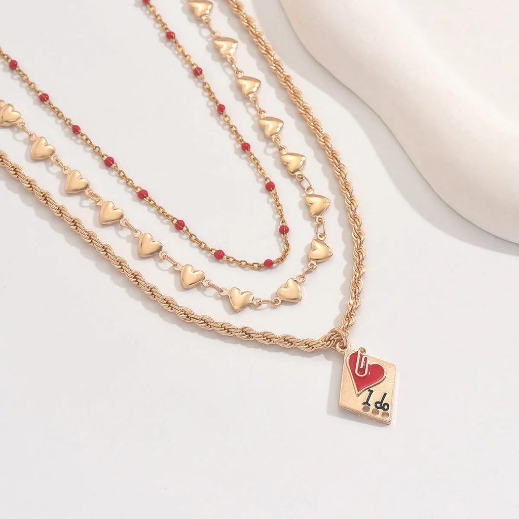 Adjustable geometric heart clavicle necklace with three-layer zinc alloy pendant on chain