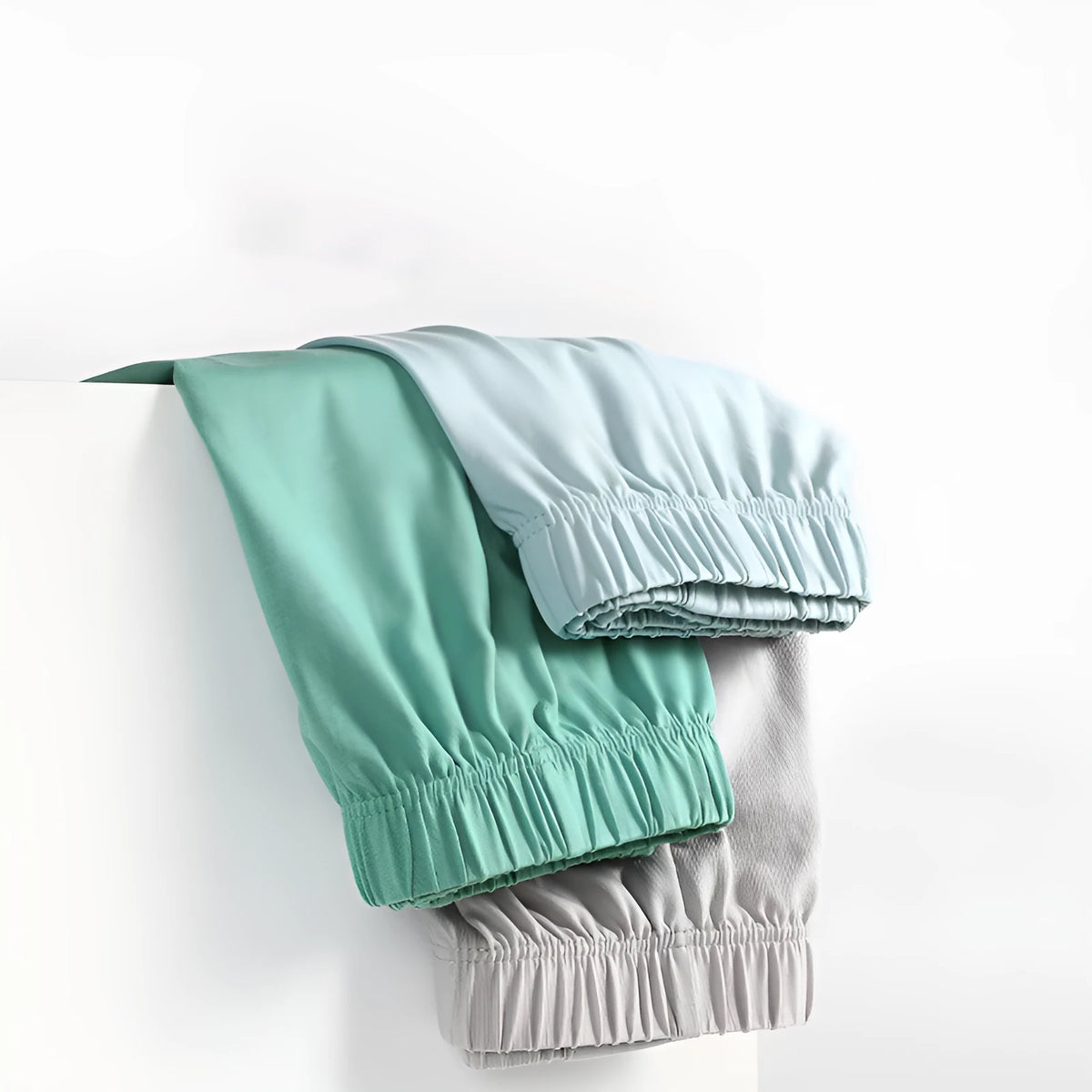 Men's loose-fitting cotton boxer shorts in gold, green, sea blue or light grey colours with mid-waist design
