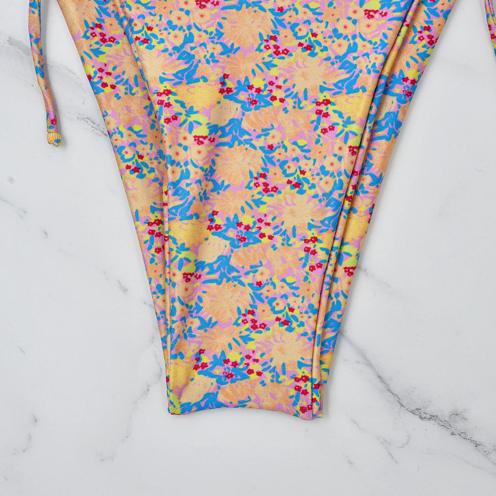 Lace-up bikini swimsuit with backless design and split briefs style in picture colour
