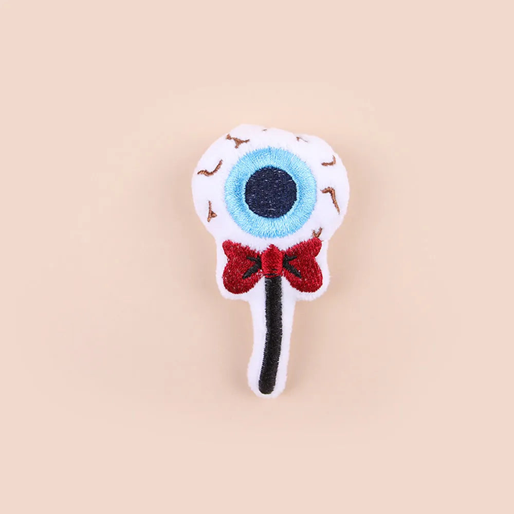 Small plush cat teaser wand toy in candy design colour variant