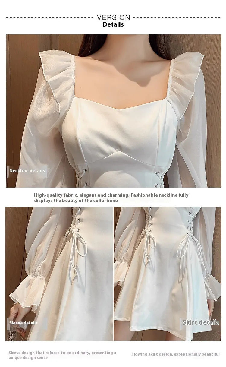 White women's formal dress with chiffon patchwork detail, long sleeves, and a full-length skirt on a mannequin.