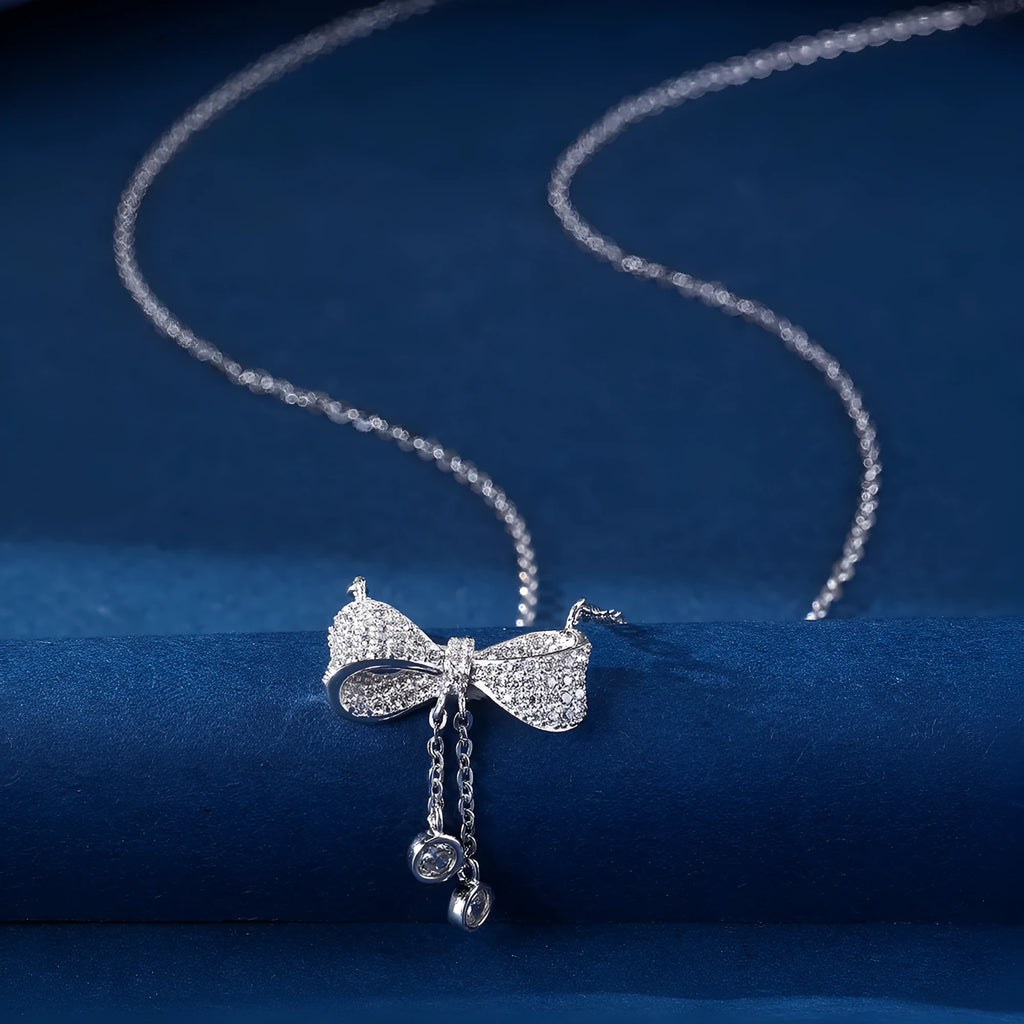 925 sterling silver necklace with bow pendant on a 40-45cm O-ring chain