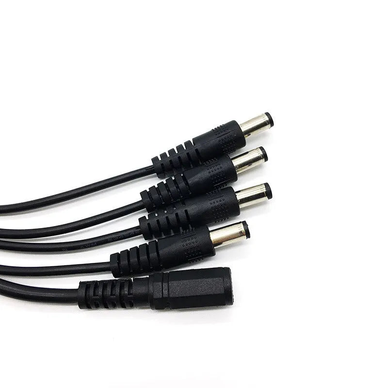 Black DC 1-to-4 monitoring power cord with 5.5mm connectors for CCTV security systems