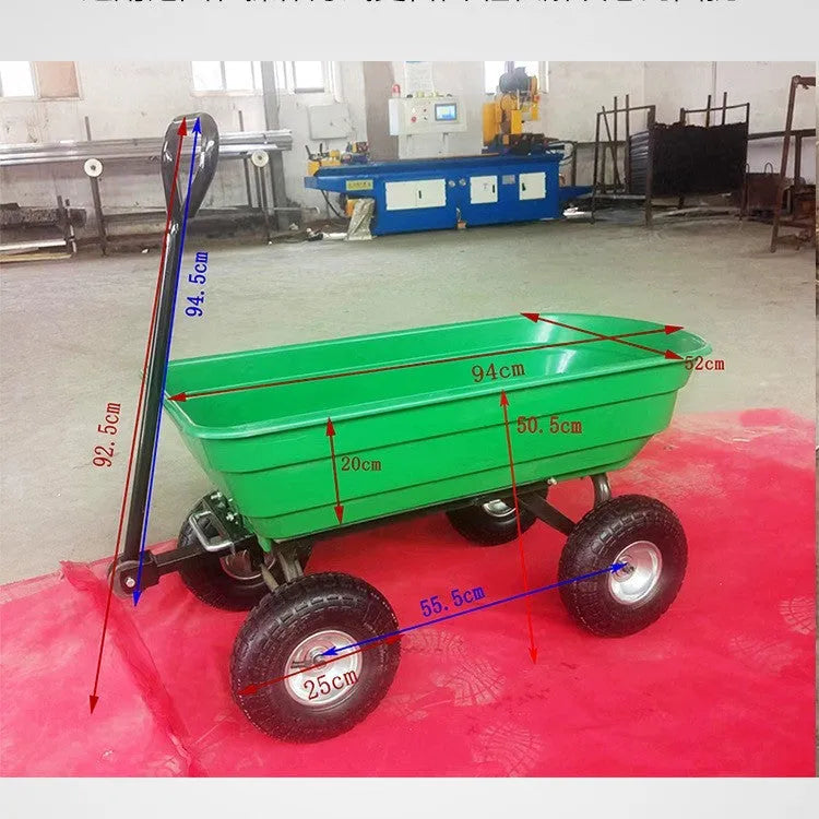 Green four-wheel plastic dump truck with a large load bed, model TC2145.