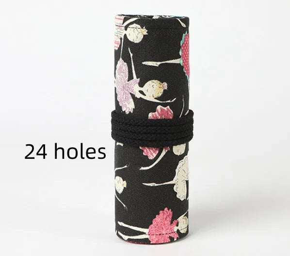 Canvas rolling pencil case with ballet girl print, showing multiple holes for colour pencils.