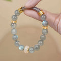 Emerald green Tian Shan Cui half bracelet with floating flower design for women
