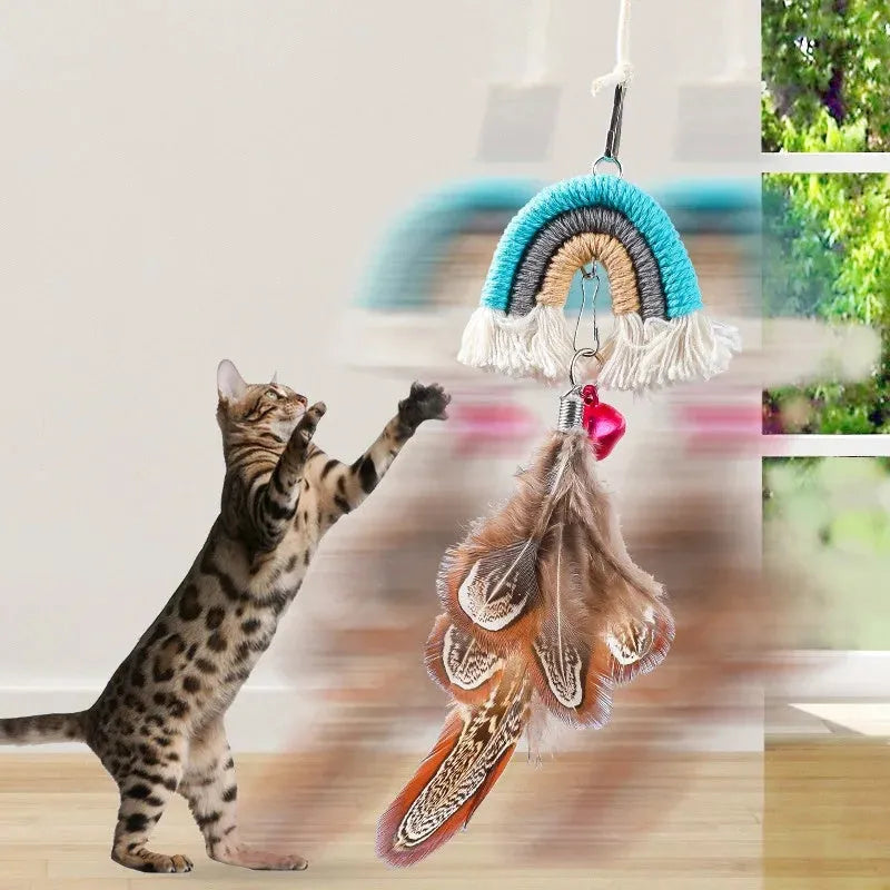 Blue feather cat rope toy hanging from door with elastic swing design and sticky buckle clamp