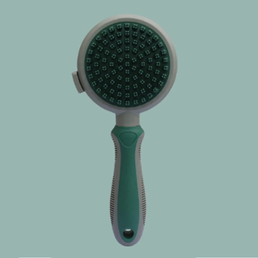 Green and pink double sided cat grooming brush with release button and flea comb