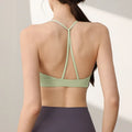 Women's nylon sports vest with fixed double-shoulder straps in multiple colours on a size chart.