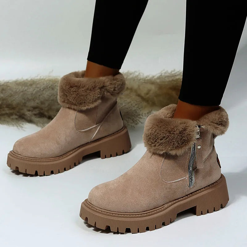 Women's black faux suede high-top snow boots with side zip and non-slip rubber sole.