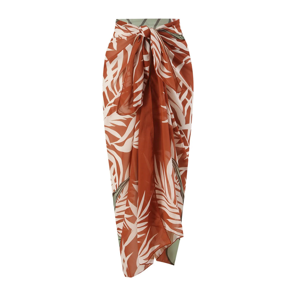 Brown women's high-waisted swimsuit with push-up top and a sheer black chiffon dress overlay.