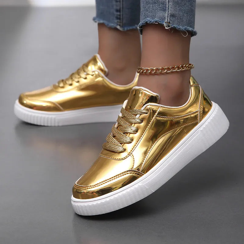 Rose gold and gold sequinned platform sneakers with round toe and thick MD sole.