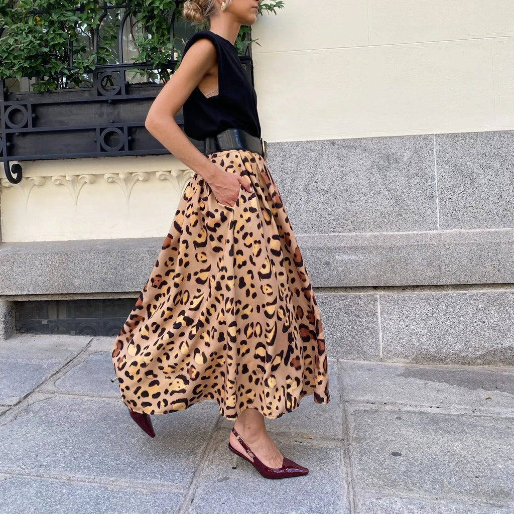 Women's brown leopard print A-line long skirt with big hem design on mannequin