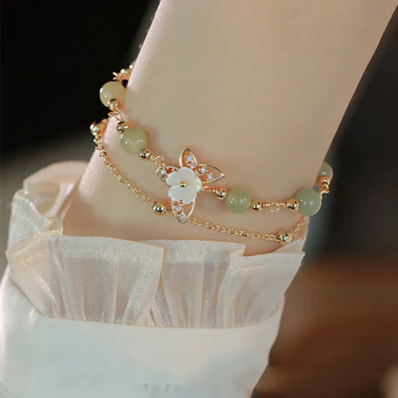 Yellow gold electroplated copper butterfly bracelet with geometric shape for women