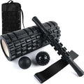 Black foam massage roller stick with six gear segments, 33cm long.
