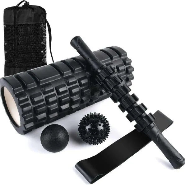 Black foam massage roller stick with six gear segments, 33cm long.