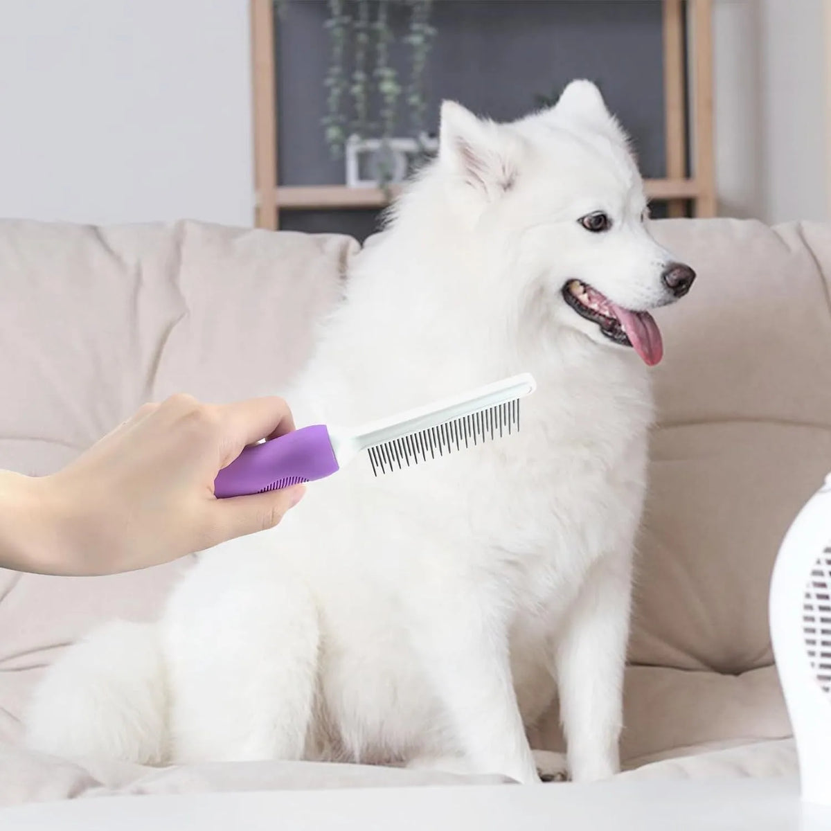 Purple pet detangling comb with stainless steel teeth and ergonomic handle for dog and cat grooming