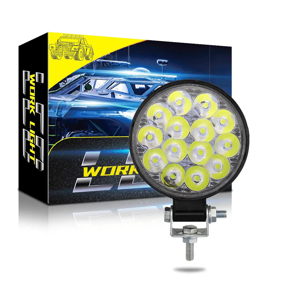 White LED work lights with round aluminum housing for car and vehicle auxiliary lighting