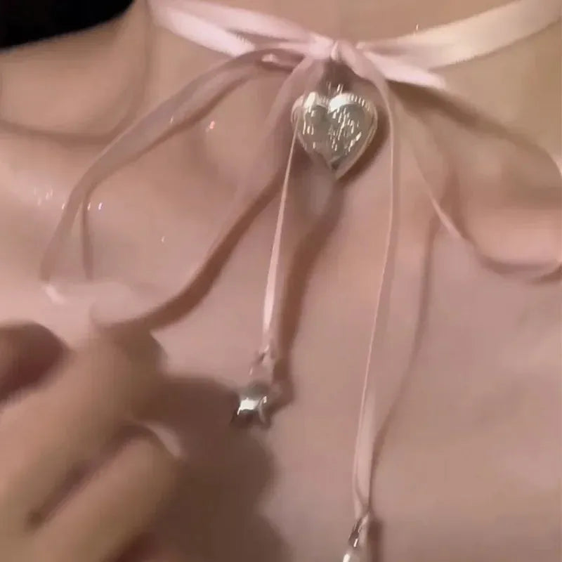 Women's alloy necklace with love pendant and ribbon design in electroplated finish