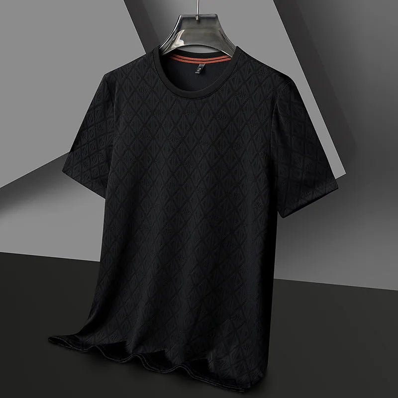 Man wearing a loose fit black jacquard short sleeve ice silk t-shirt.