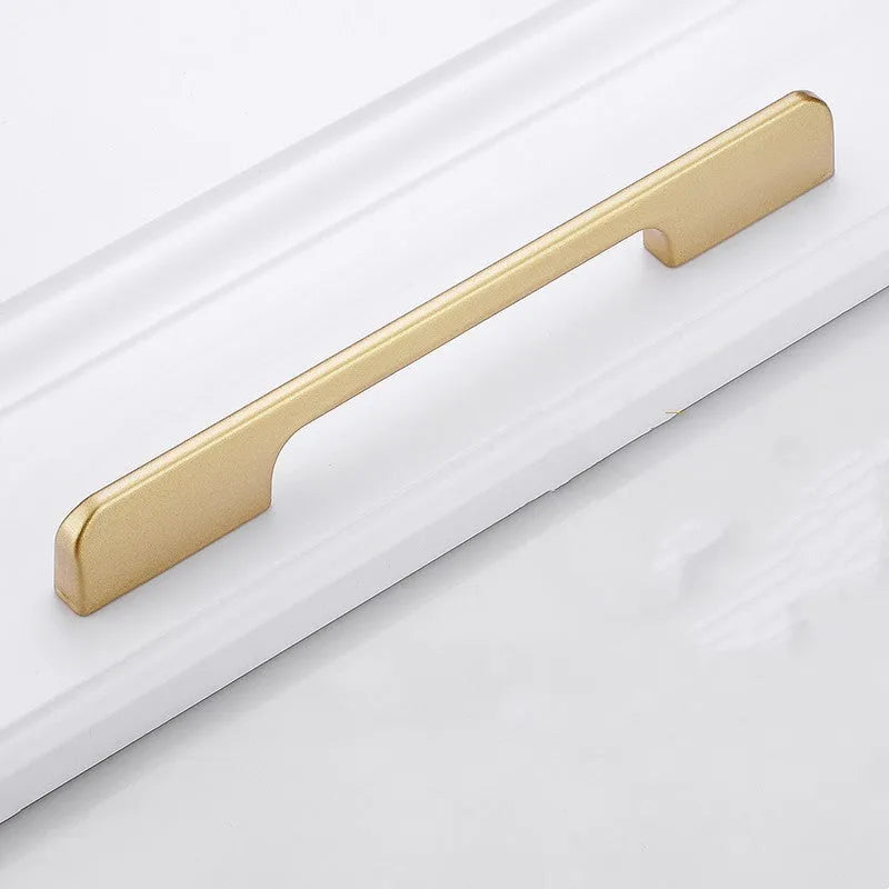 Gold aluminium T-shaped single hole cabinet handle shown from the side