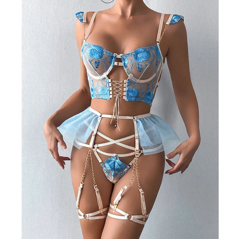 Light blue lace women's bra and pants set with mesh panels and embroidery.
