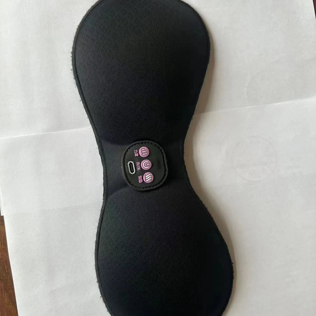 Black electric massage bra inner cushion accessory with 3-key control pad and chest stickers.