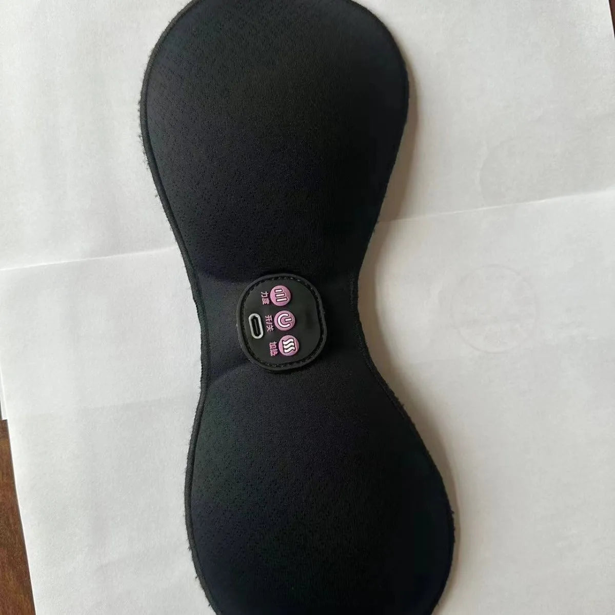Black electric massage bra inner cushion accessory with 3-key control pad and chest stickers.