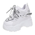 Women's white mesh platform sports shoes with a cross-strap design and rubber sole