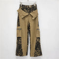 Dark khaki leopard print high-waist straight-leg jeans with tooling style stitching details