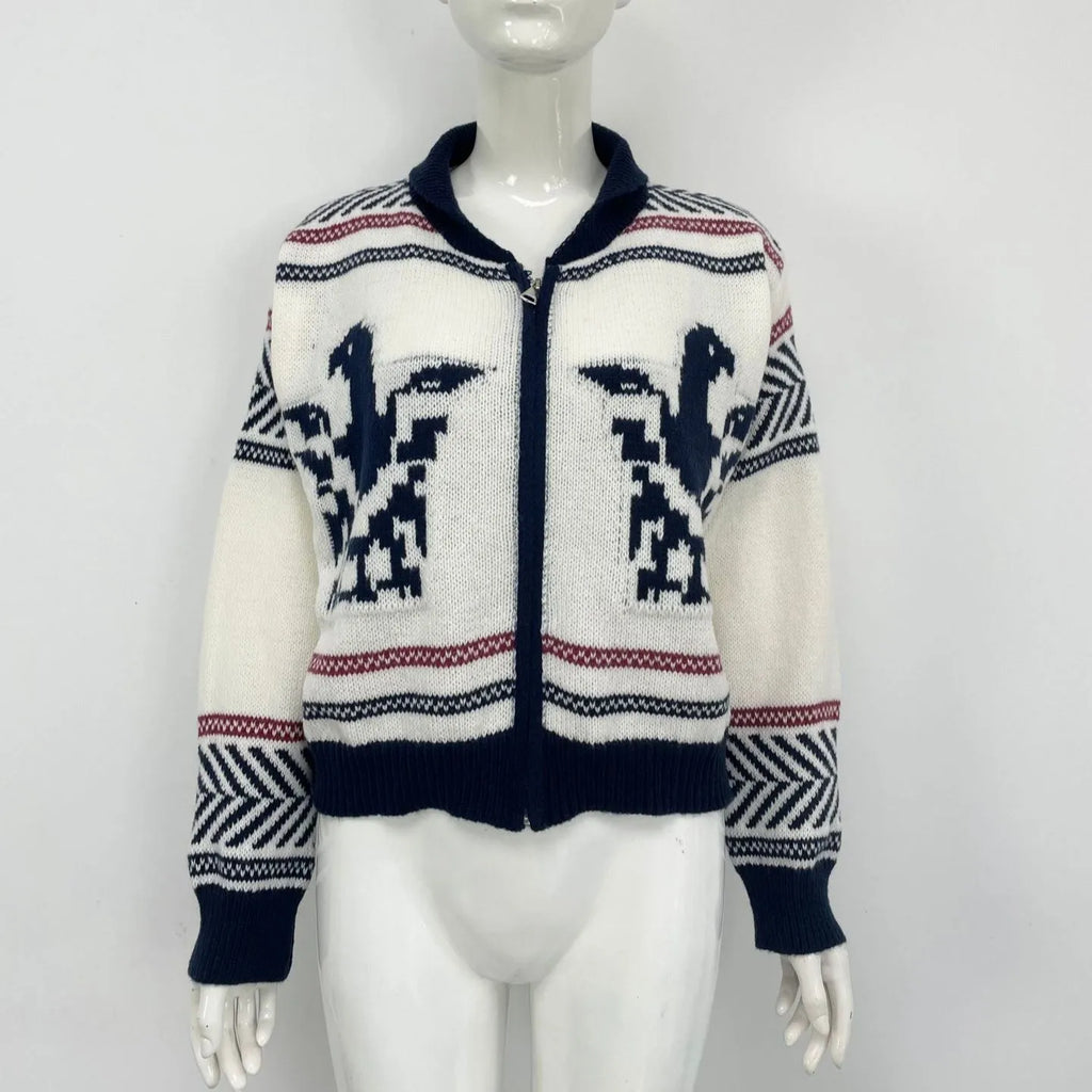 White women's cardigan with jacquard stripe pattern, zip front, and lapel collar on a hanger.