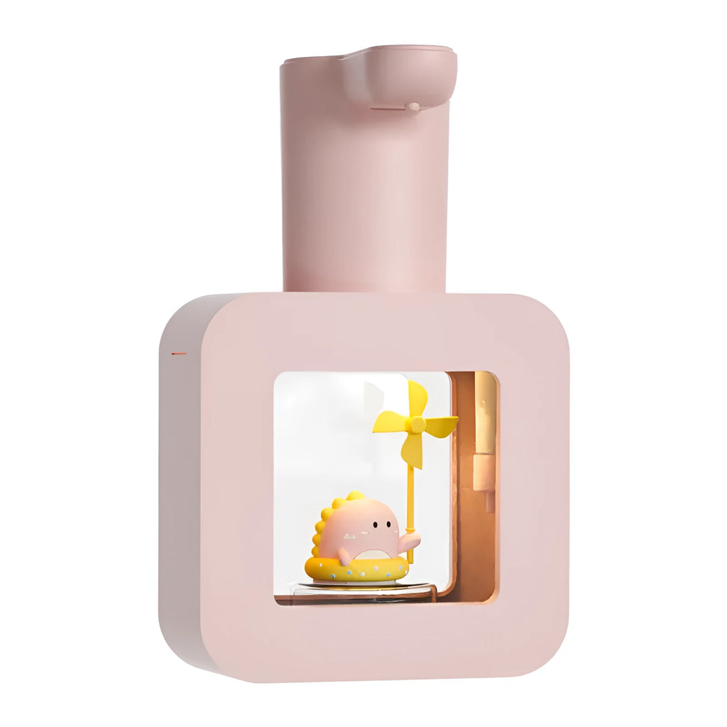 Pink automatic touchless foam soap dispenser for kids with a cute cartoon unicorn design.