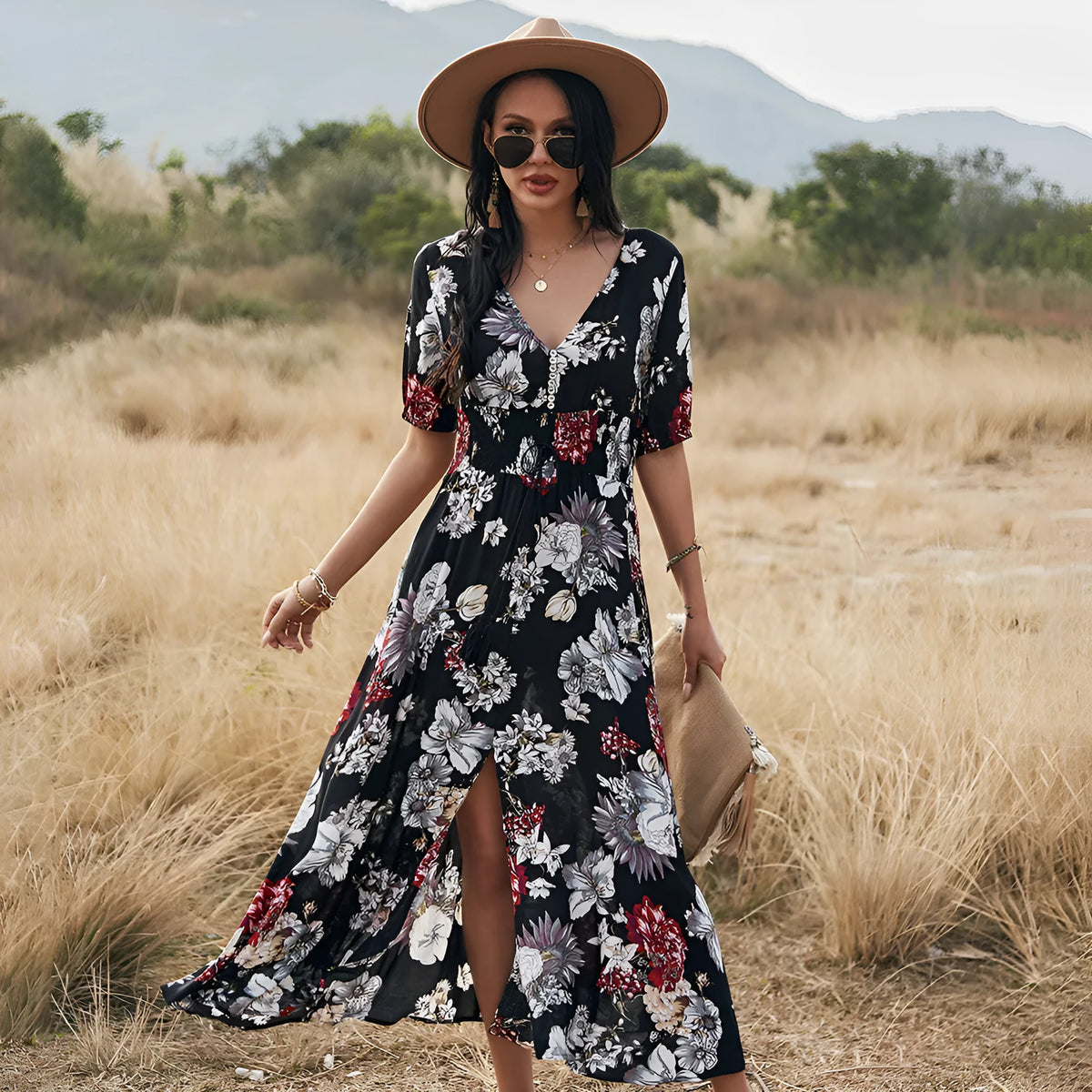 Yellow floral print summer dress with V neck and elastic waist on mannequin