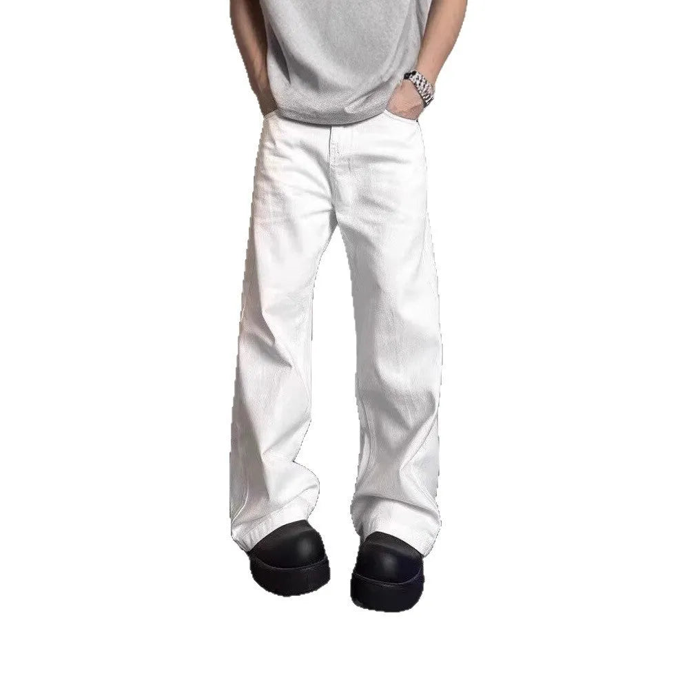 Men's white straight-leg cotton jeans with a mid-rise waist and zipper fly