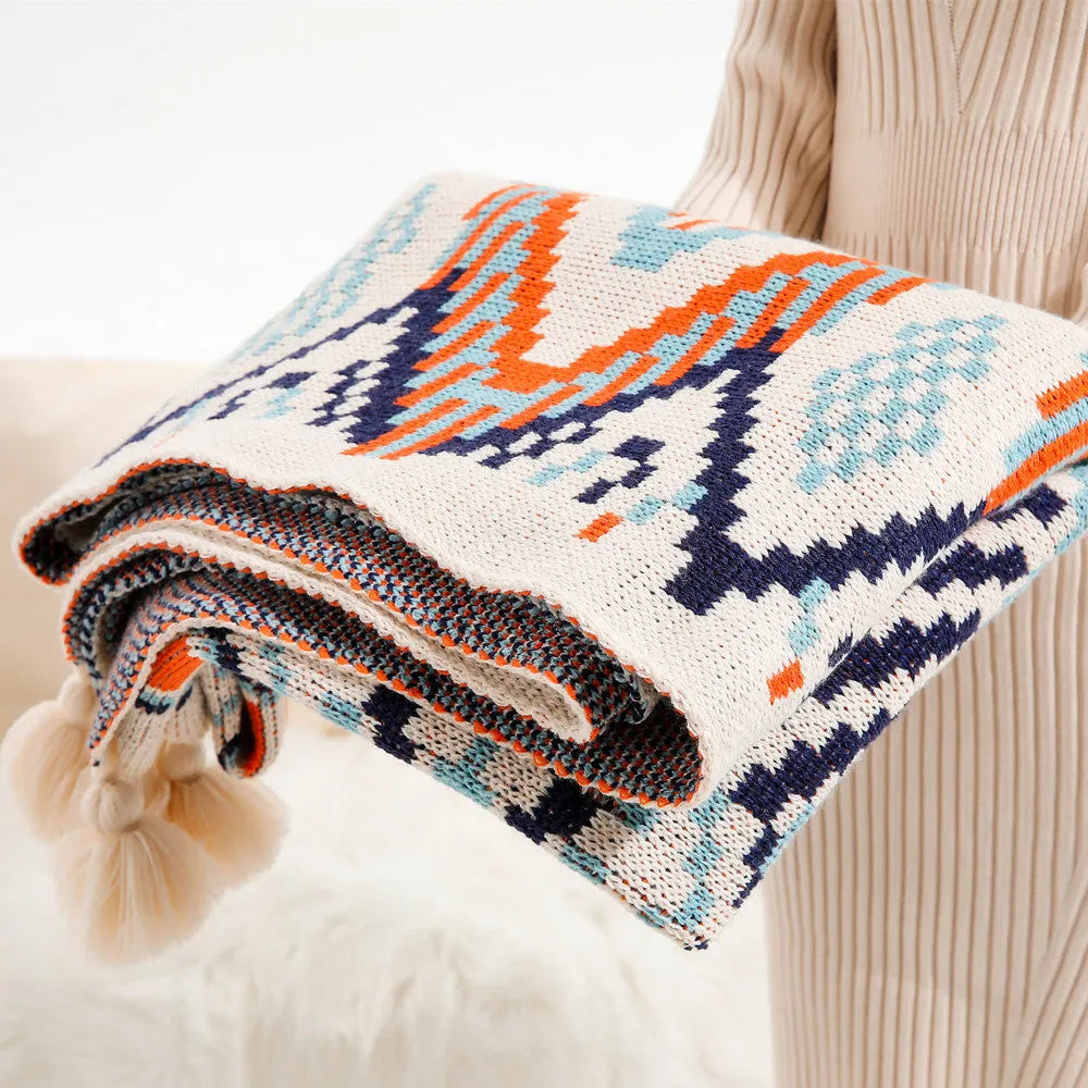 Acrylic sofa blanket with tassels in geometric pattern colour option
