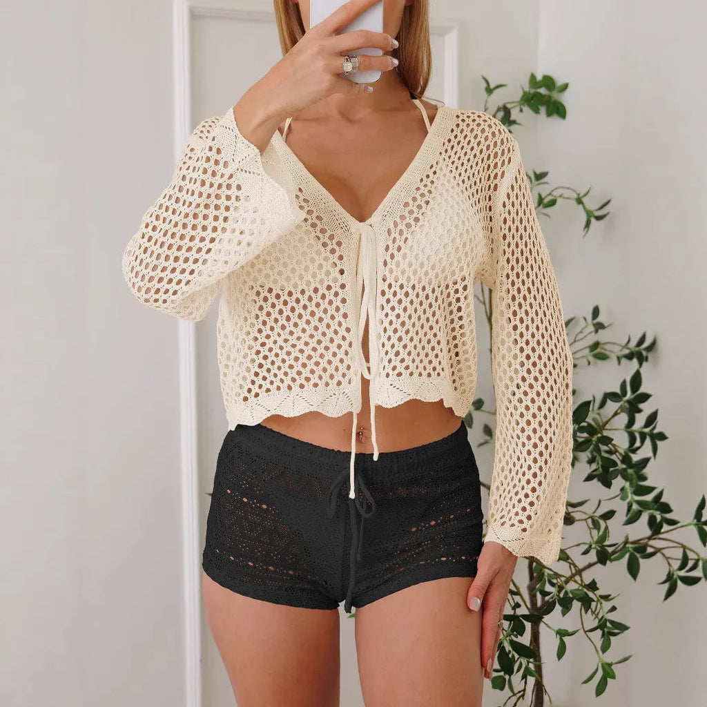 Women's apricot hollow woven cardigan blouse with bell sleeves shown open as a layer