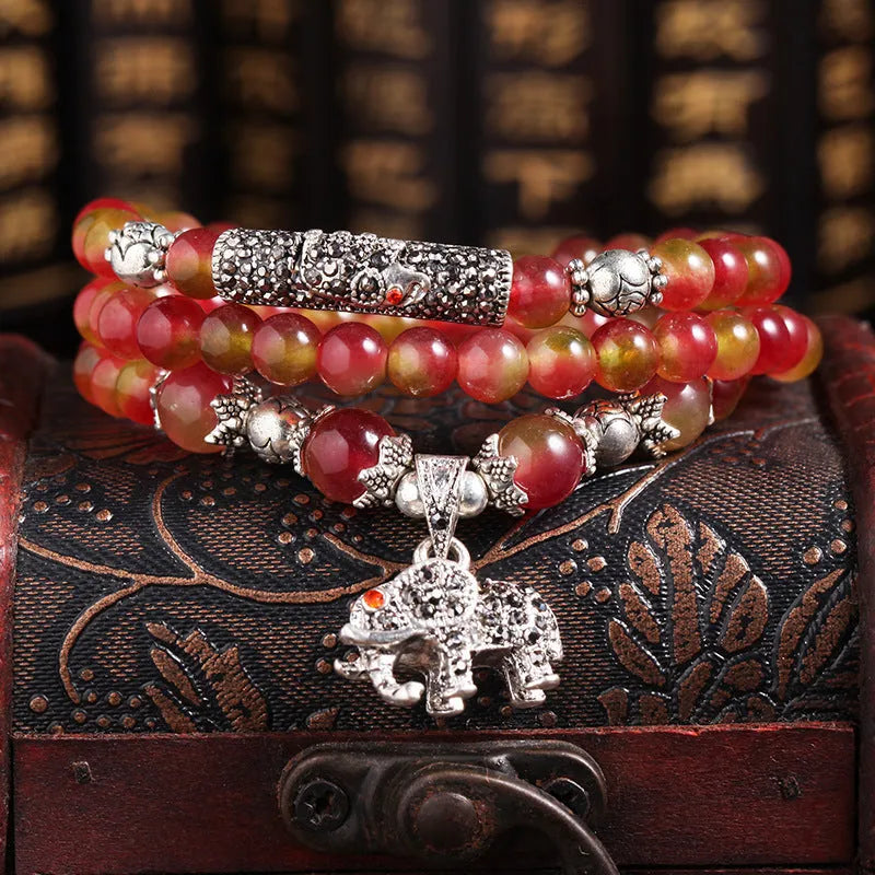 Natural watermelon crystal bracelet with Chinese knot closure and geometric beads