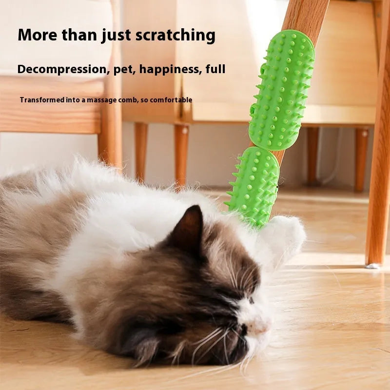 Silicone cat grooming comb with adjustable strap attached to table leg for hair removal and scratching relief