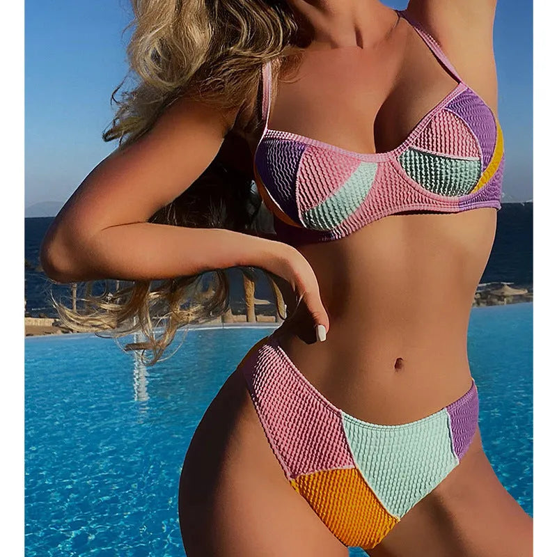 Ladies' bikini top with steel bracket push up and matching shorts in a spliced colour design.