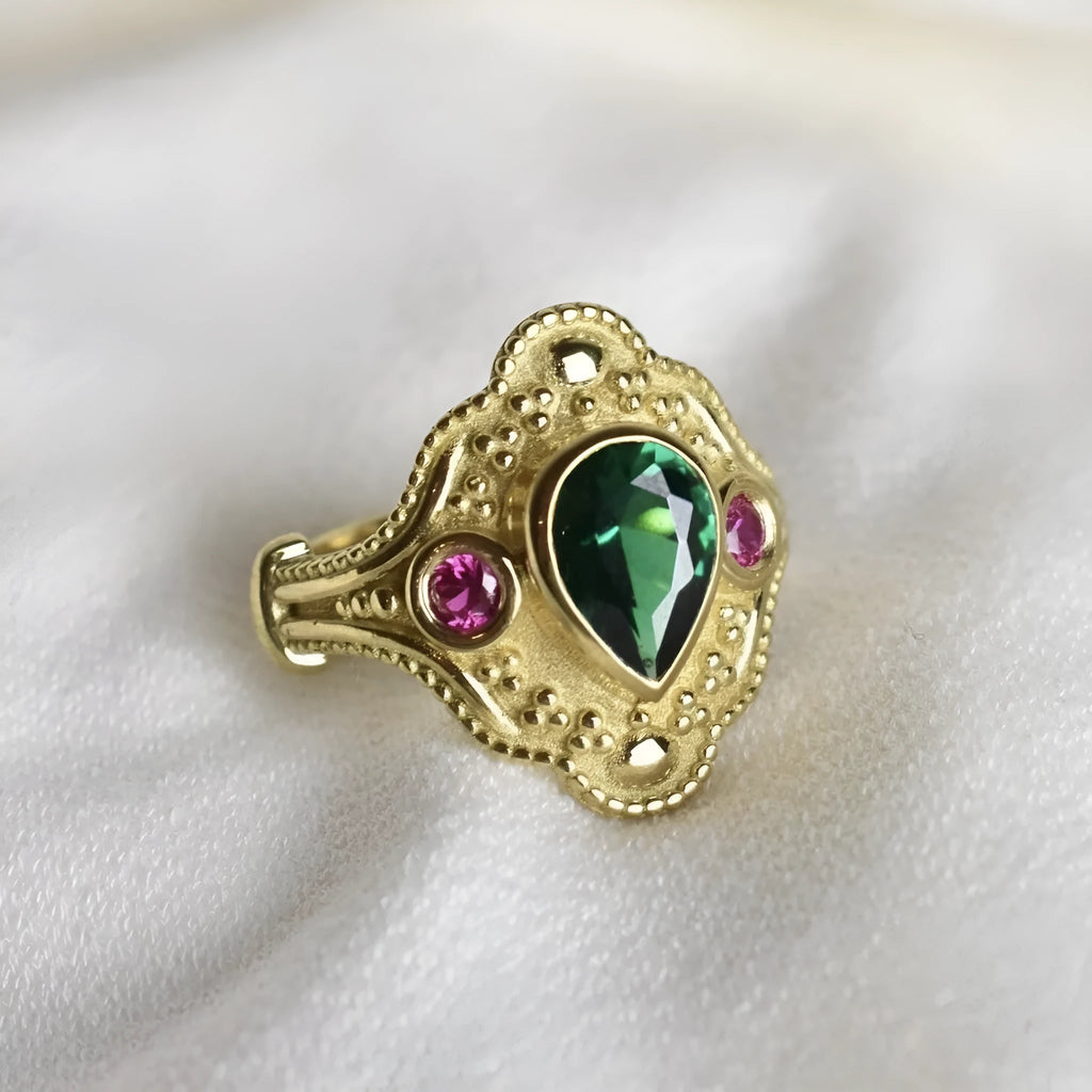 Golden geometric women's alloy ring with gold-plated electroplated finish.