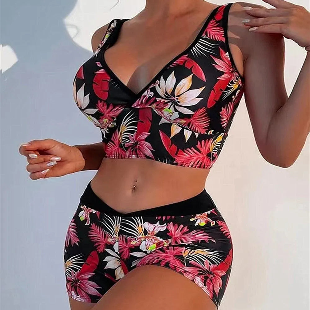 Women's two-piece swimsuit with sleeveless top and printed boxer briefs in multiple colour options.