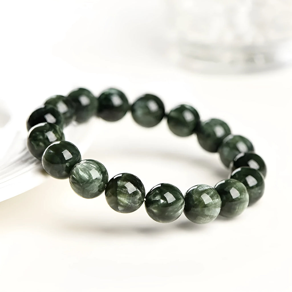 Green Dragon crystal bracelet with 8-9mm round beads showing Ruyi symbolism elements