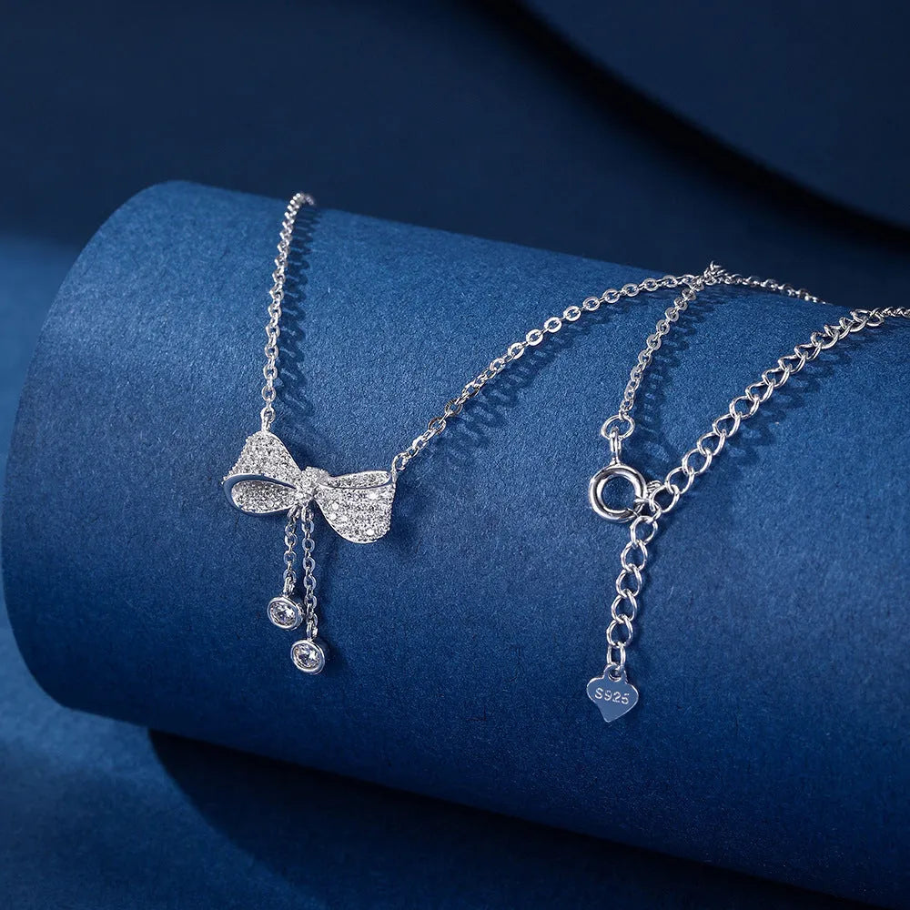 925 sterling silver necklace with bow pendant on a 40-45cm O-ring chain