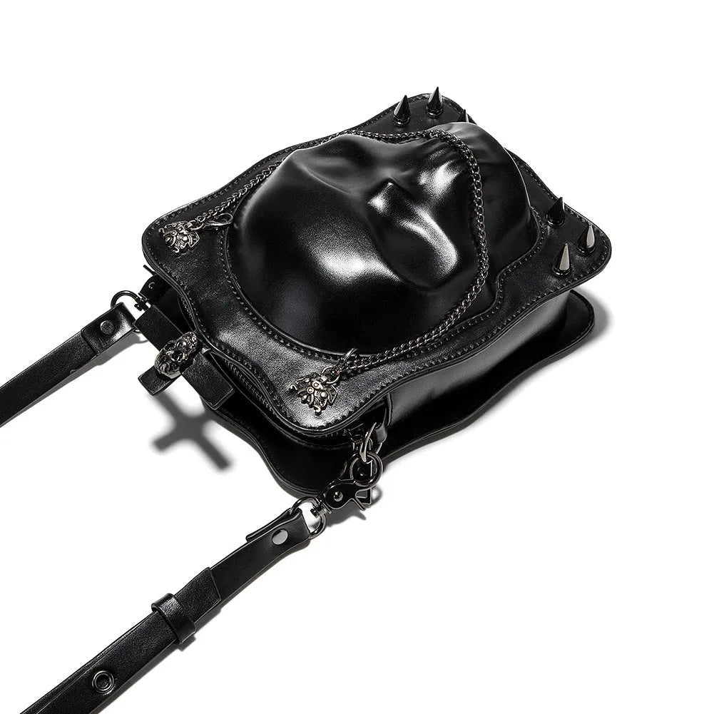 Black mini square messenger bag with gothic stitching, rivets, and skull design
