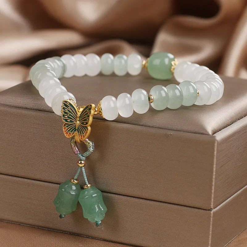 Green Tian Shan Cui abacus bead bracelet with retro butterfly tassel and pearl decoration