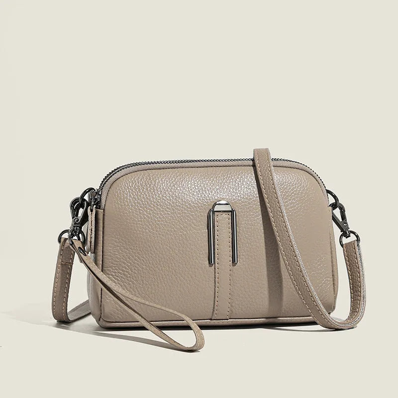 Genuine leather women's shoulder bag in a horizontal square shape, shown in black colour.