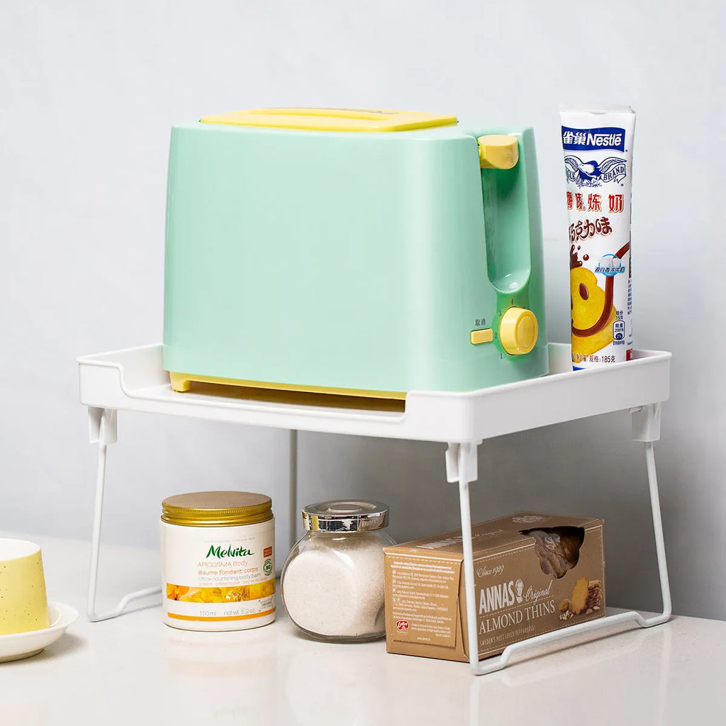 Plastic kitchen supplies rack in transparent and white colour options for desktop or cupboard organisation