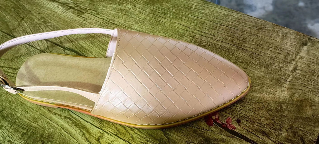 Pointed-toe flat sandals with an instep buckle strap, shown in one of six available colours.